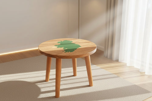 Round wooden side table with a green Ireland design 