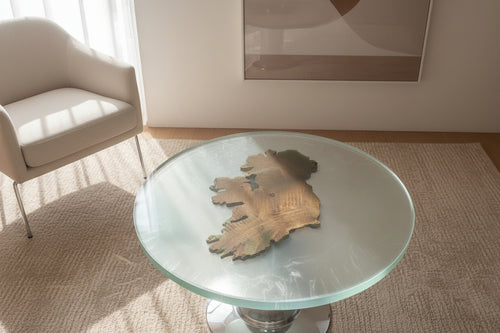 Resin table with a textured surface and wooden Ireland inset