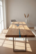 Wooden table with a blue resin inlay